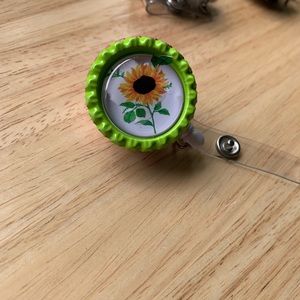 Sun flower badge reel